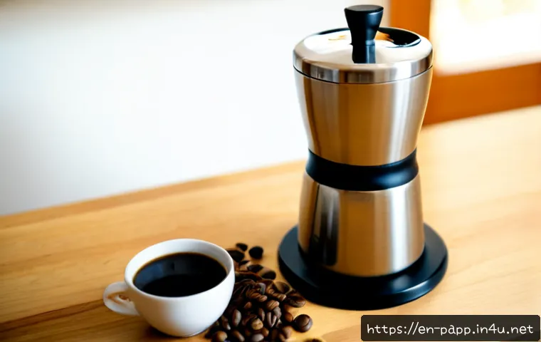 Home 17 휴대용 커피 그라인더 - Photorealistic close-up of a sleek stainless steel portable manual coffee grinder standing beside sc...